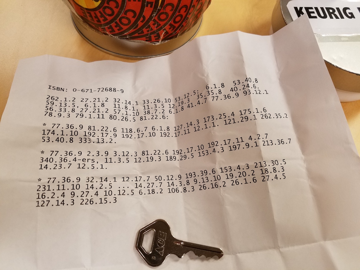 Half-page of printed numbers and a key